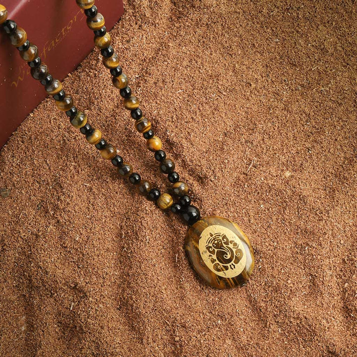 Obstacle Redeemer 108 Ganesha Pendant Tiger Eye Obsidian Mala